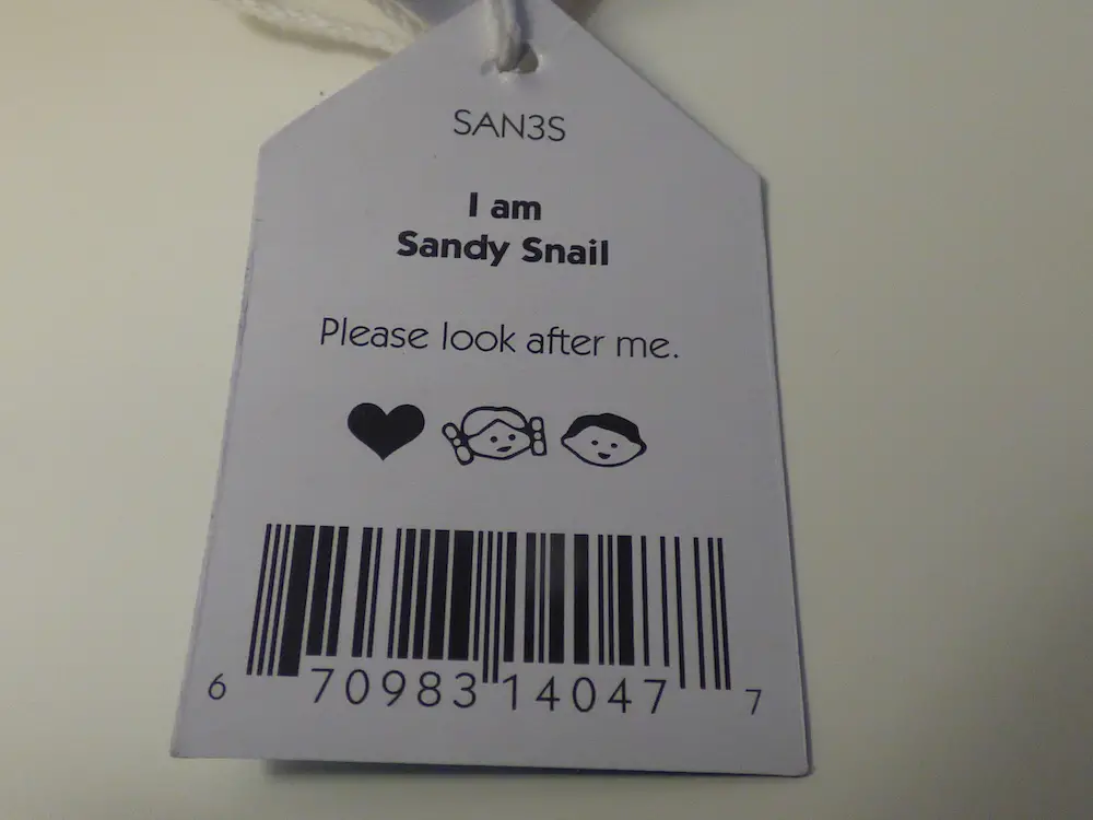 Sandy Snail hang tag